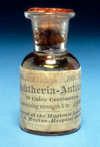 A photograph of one of the first bottles (1895) of diphtheria antitoxin produced at the Hygienic Laboratory