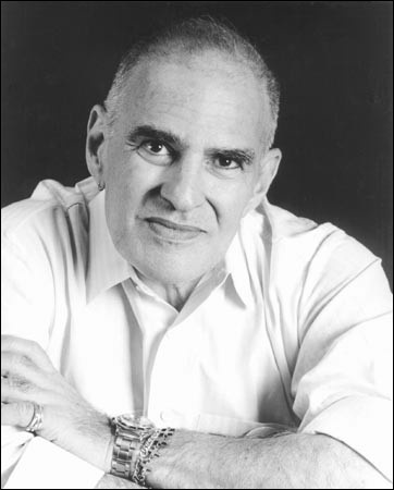 Larry Kramer, writer and early AIDS activist, asserted his concerns in animated dialog between the AIDS community and people who guided government policy. 