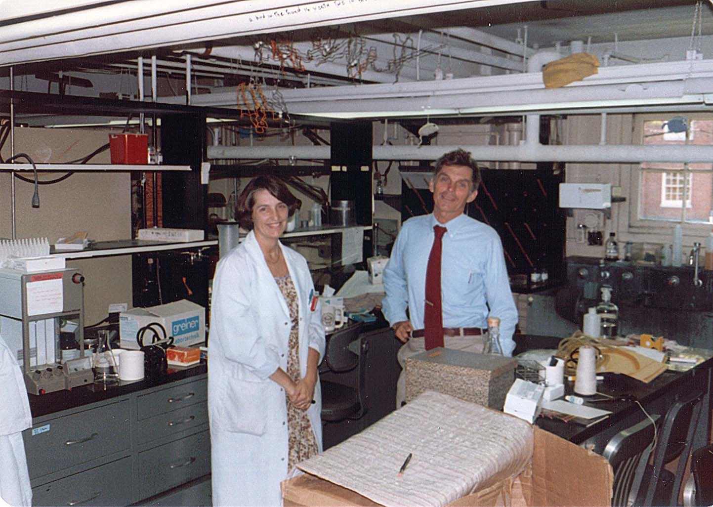 Potter and Mushinski standing in the lab