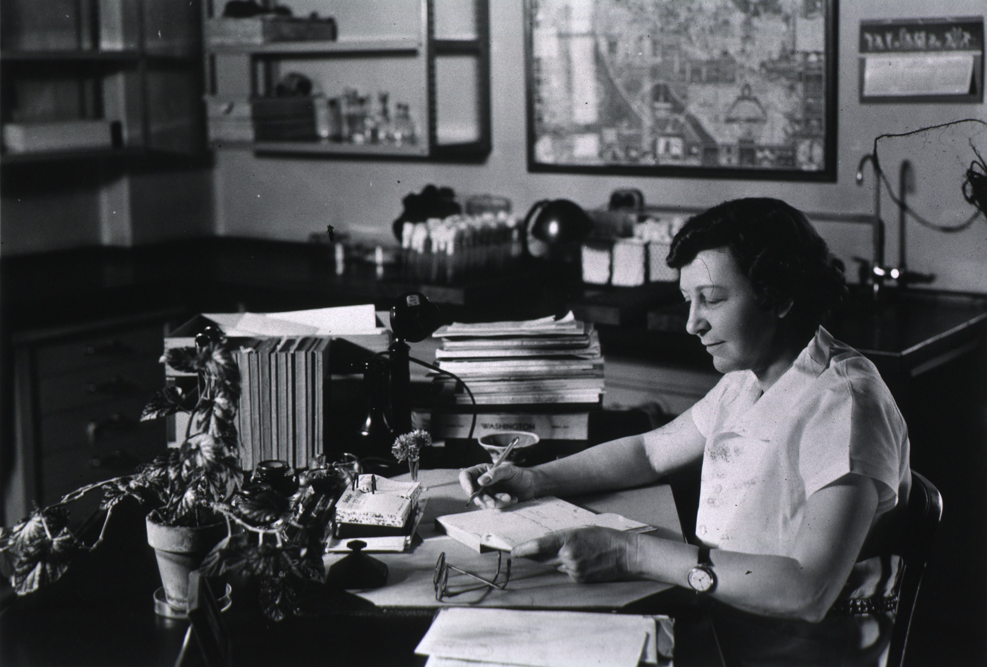 Photo of Dr. Branham seating at her desk
