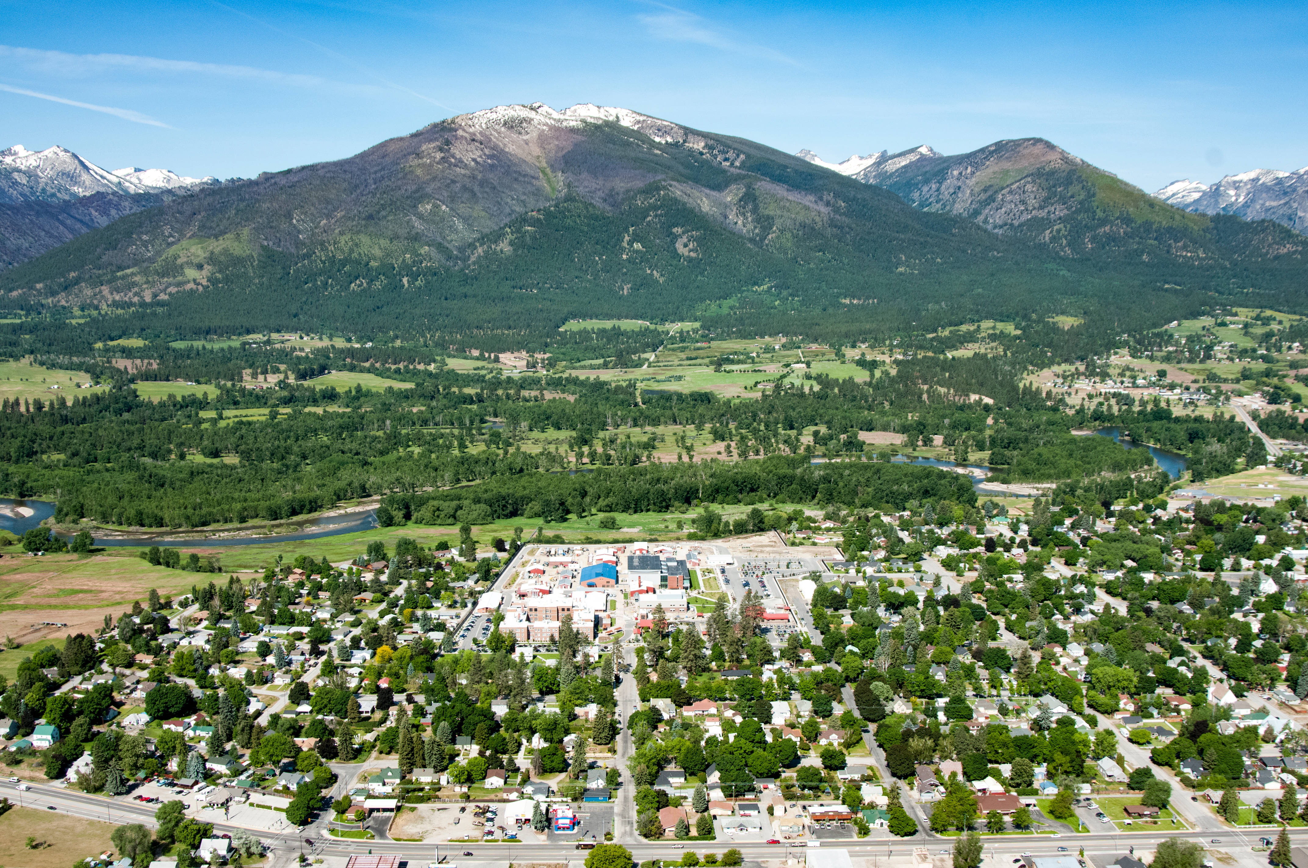 Aerial of Rocky Mountain Laboratory campus snuggled in the Bitterroot Valley with Downy Mountain rising behind it.
