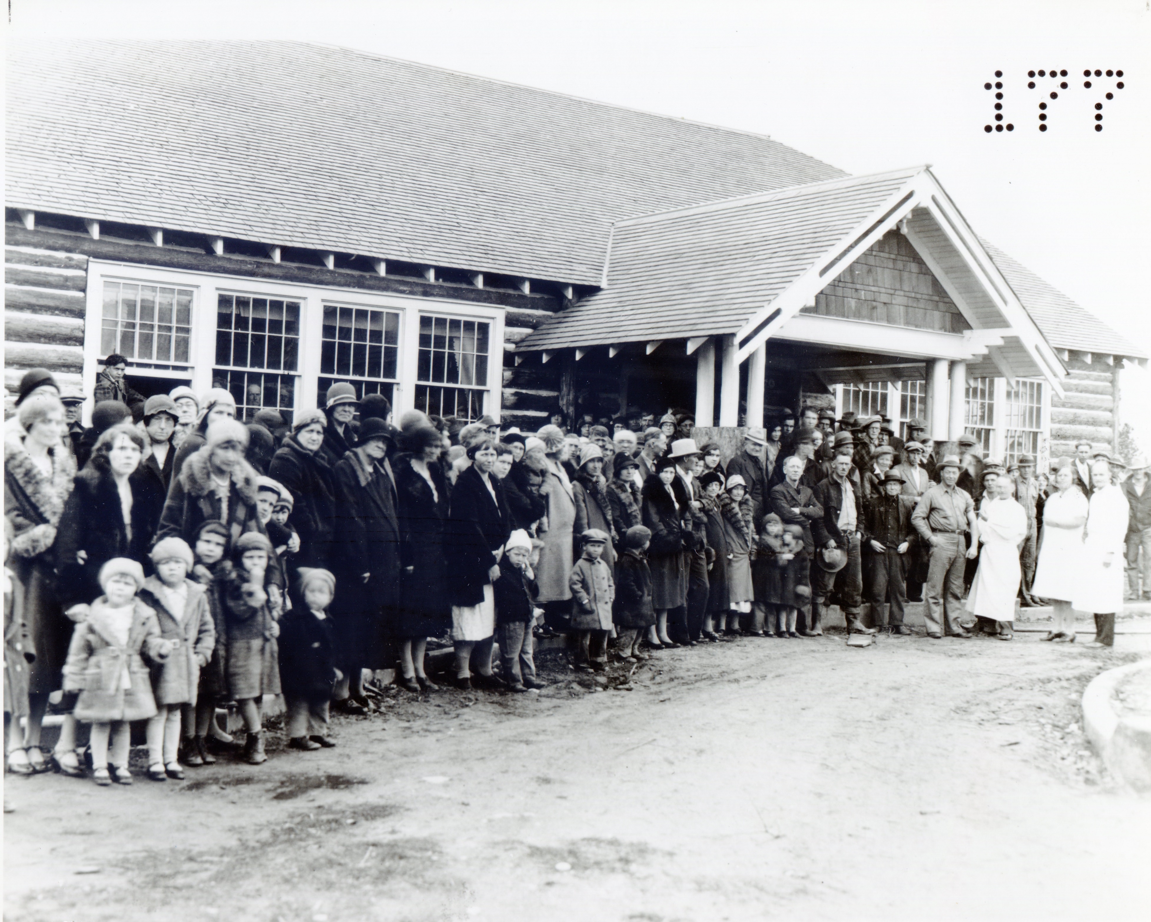 Families pose in front of a vaccination clinic in Darby, Montana