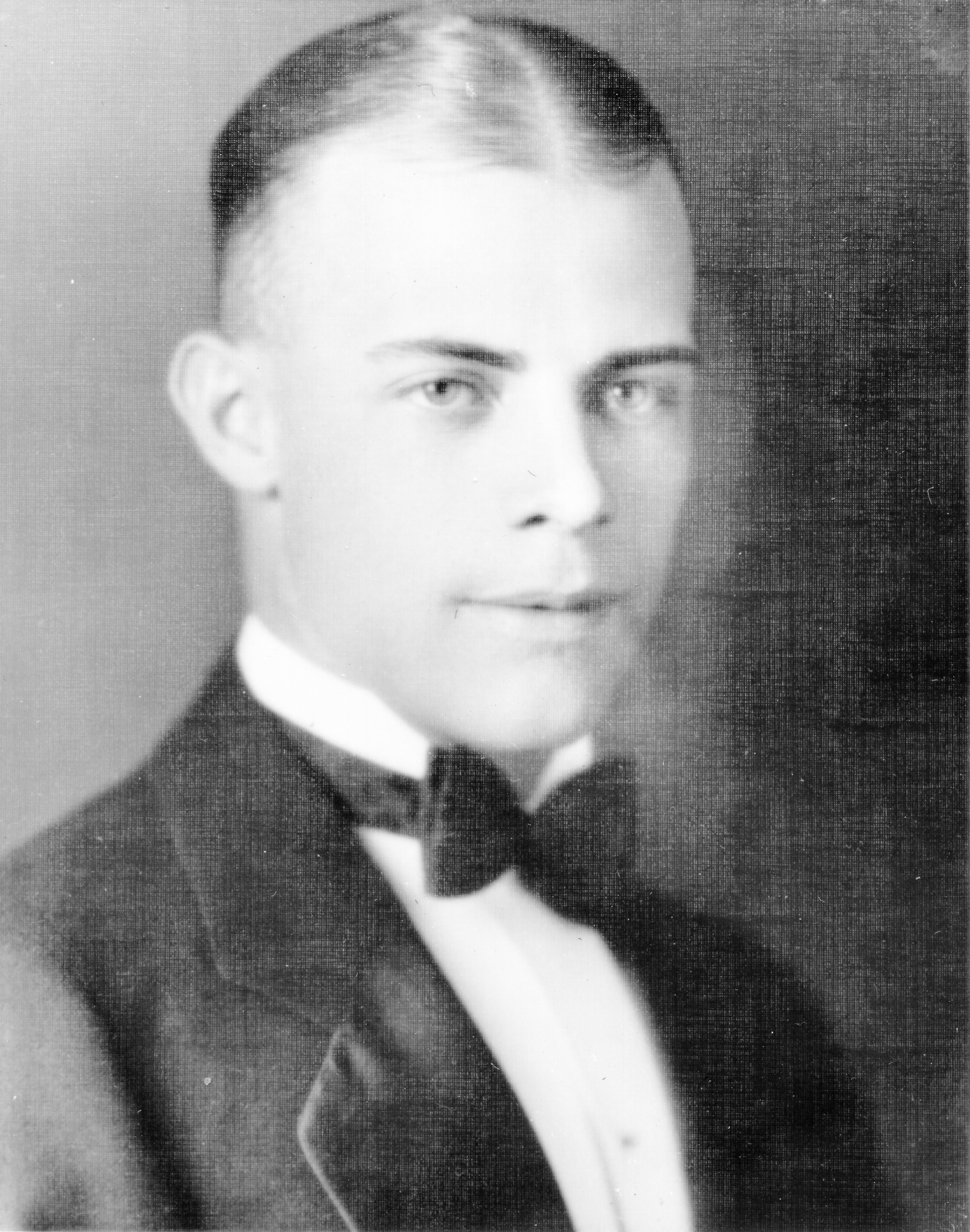 Arthur Kerlee portrait from yearbook. He has light eyes and a bow tie. 