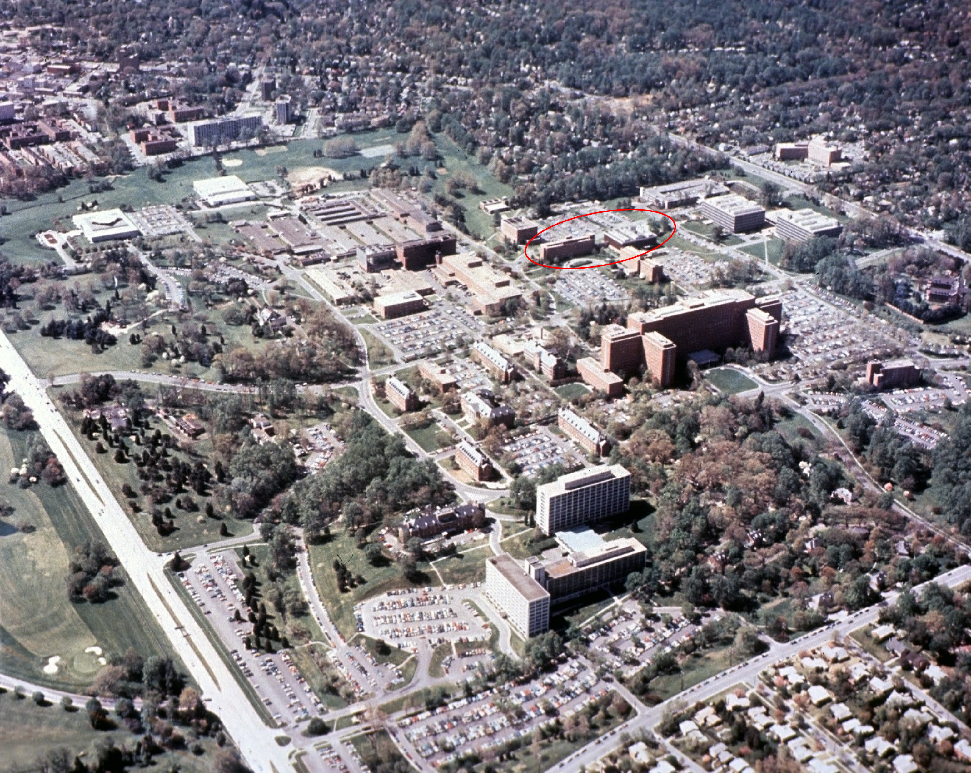 a circa 1975 aerial image of NIH Bethesda campus with Buildings 29 and 29A circled