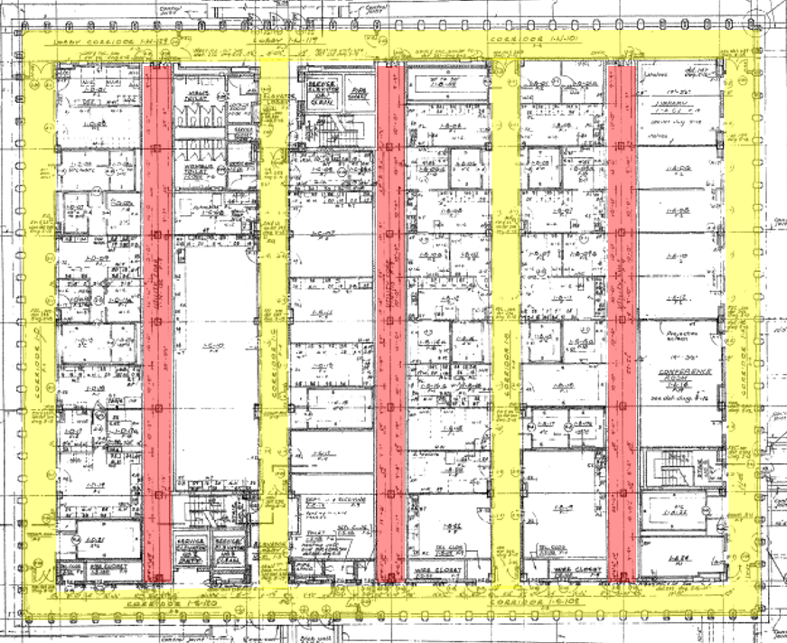 a black and white first floor plan of Building 29A with red boxes showing utility cores and yellow boxes showing pedestrian circulation