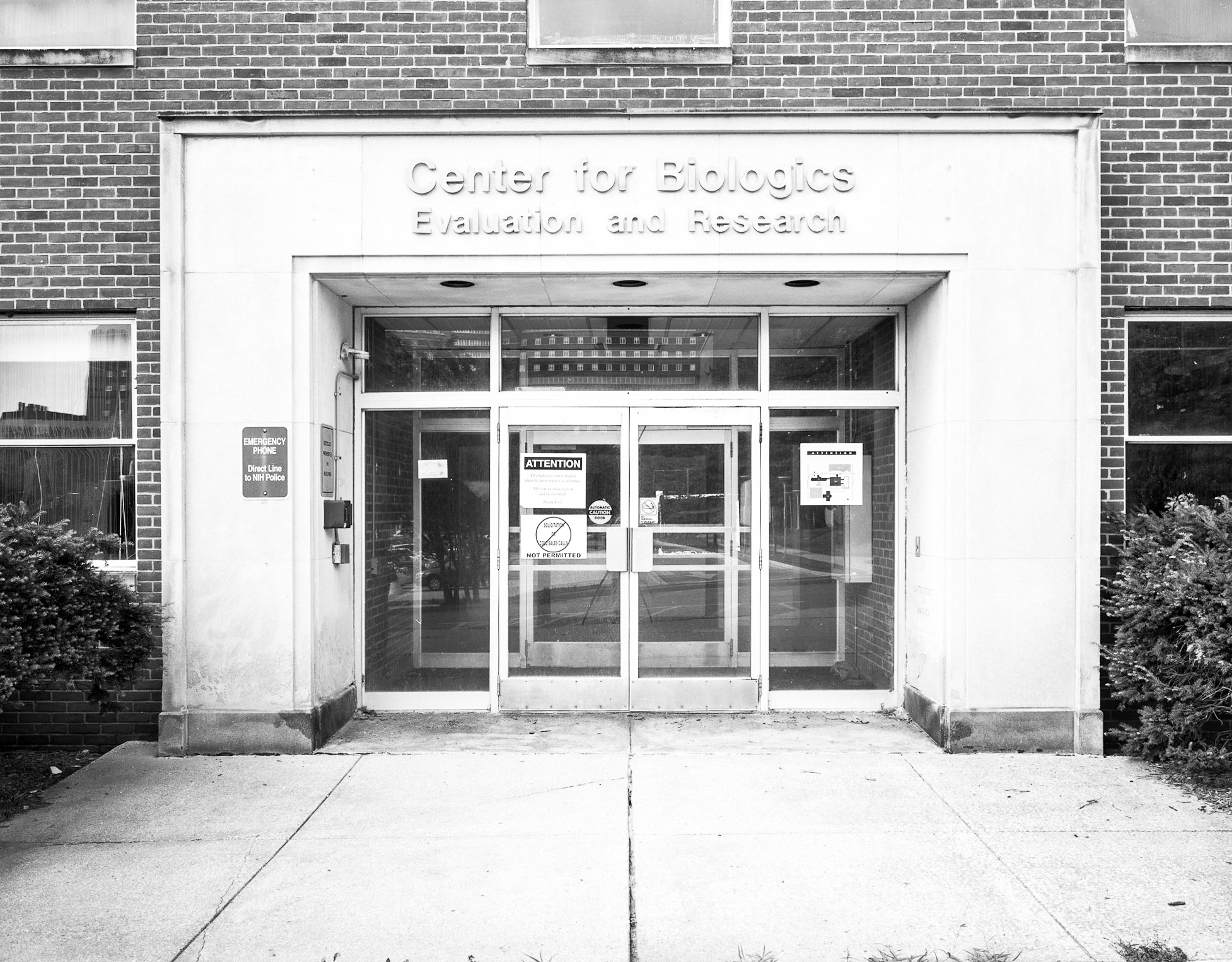 a monochromatic photograph of the entrance to building 29