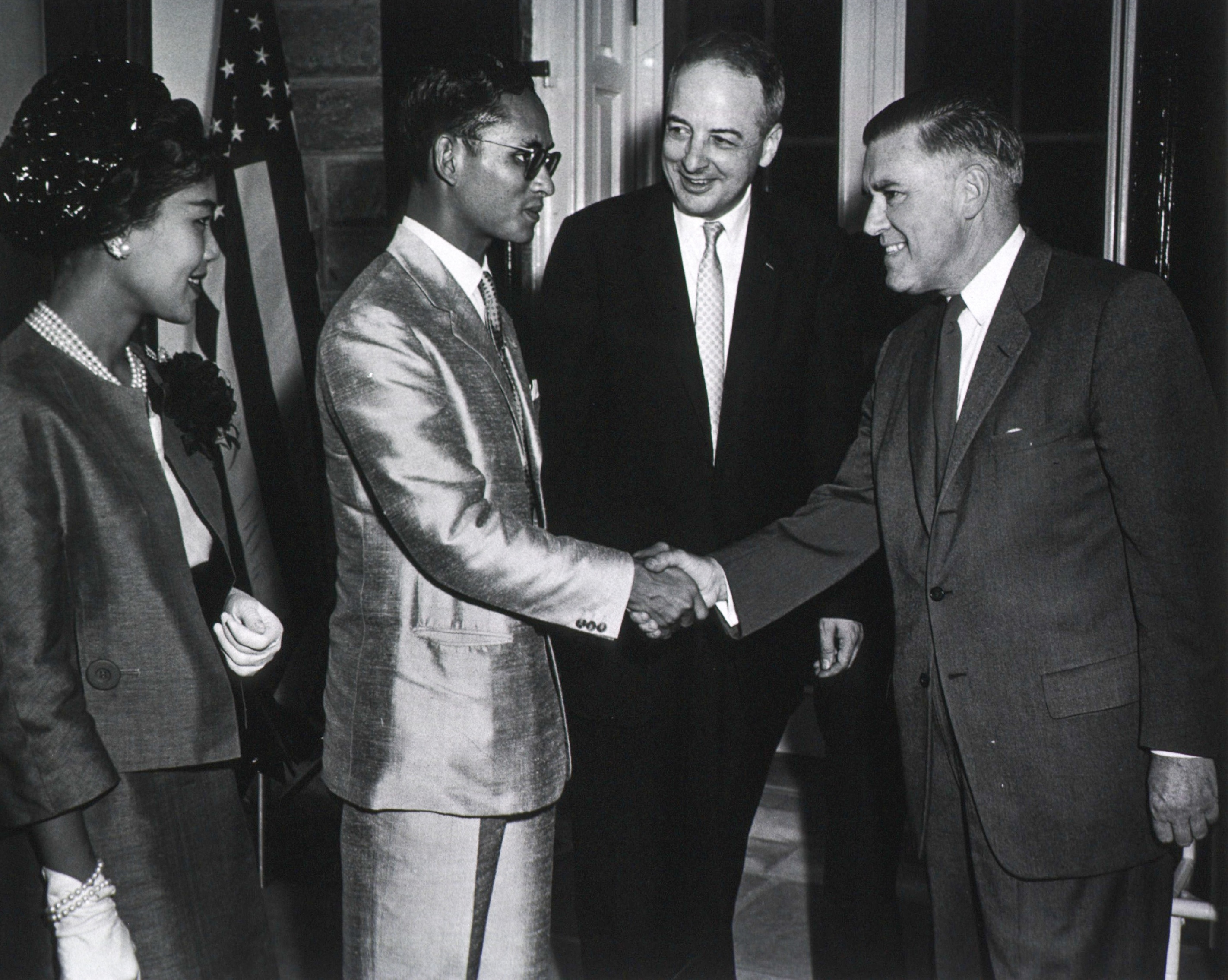 The king of Thailand shaking hands with Roderick Murray during 1960 dedication events