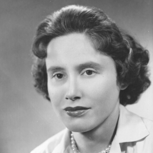Black and white photo of Dr. Kirschstein wearing pearls and a blouse