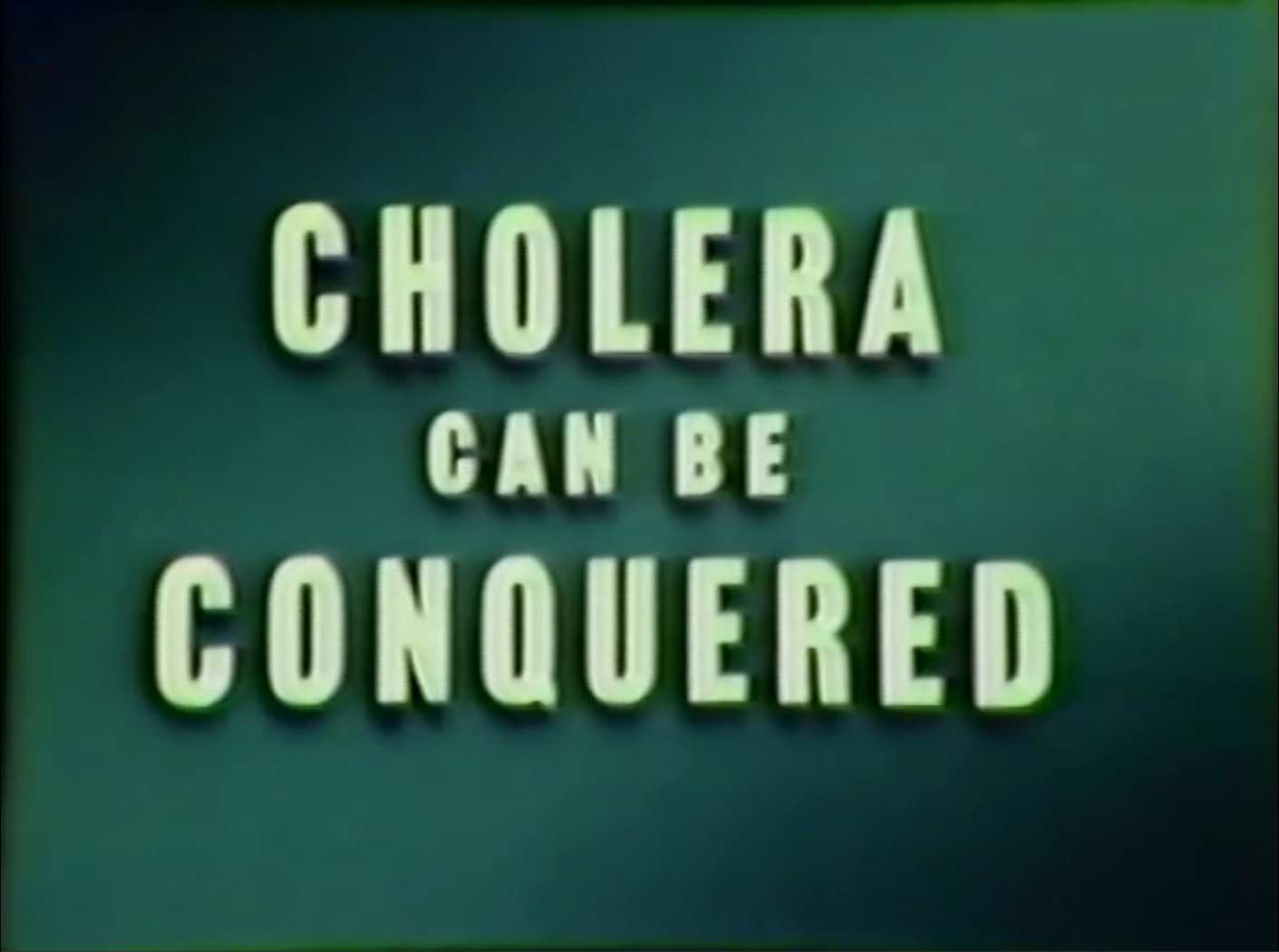 a frame from a film reading Cholera Can Be Conquered