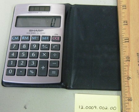 Photo of a Sharp Elsimate EL-326M Pocket Calculator