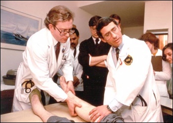 Drs. Lee Hall and Anthony S. Fauci examine participant in early AIDS study