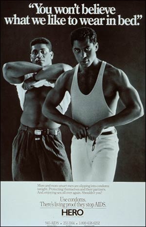 Poster featuring two muscular men disrobing