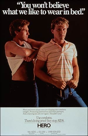 Poster featuring two muscular men disrobing
