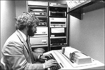 Photograph of Rick Gracely at the computer