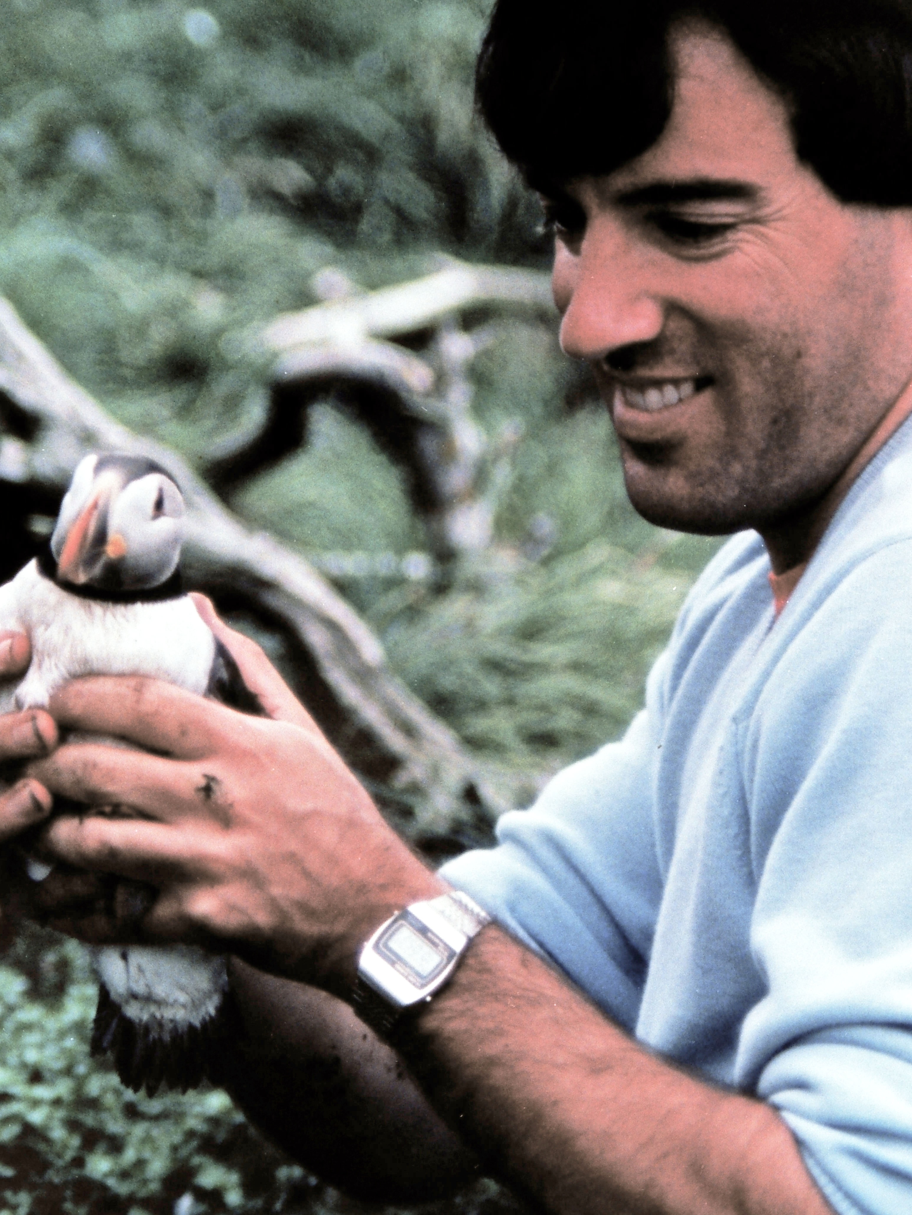 Dr. Schwan holding a puffin